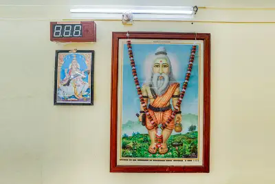 Prayer corner with framed portraits at the hospital